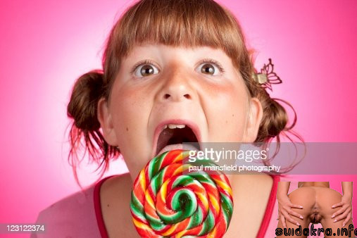 licking lollipop getty