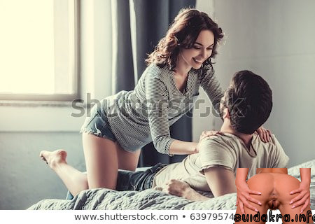 couple floor while hugging smiling passionate sex between couples in bedroom preview feet young making happy bed lying passionate