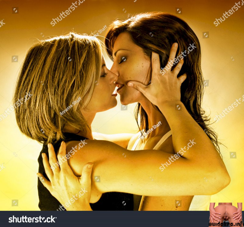 headscarved women kissing shutterstock each